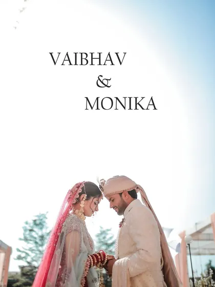 A simple, elegant portrait of the couple touching foreheads after their wedding ceremony.
