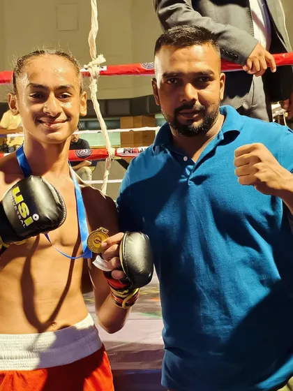 My best fighter, Kartar Singh, after another victory. His dedication is an example to everyone in the gym.