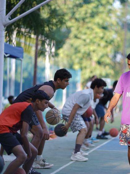 A coach leads a dribbling drill at our skills workshop. We are committed to giving back to the community and sharing the Insfire experience.