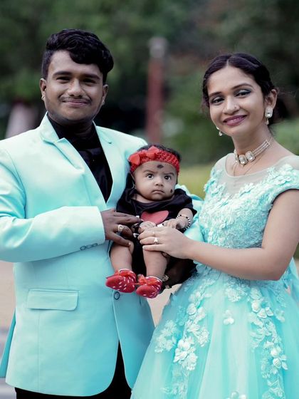 Another shot of the happy family, capturing a precious memory. My styling helps ensure everyone looks their best and the photos are cohesive.