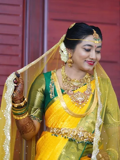 The final bridal look is pure magic. Here is one of my stunning South Indian brides, where the deep, rich stain of her mehendi perfectly complements her beautiful silk saree and traditional gold jewelry. This is the moment I work towards.