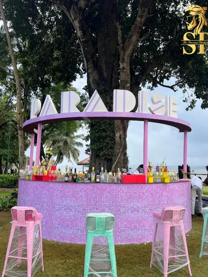 Our 'Paradise' themed bar setup for a Goa pool party. The circular bar, pastel colors, and beachside location created a perfect tropical vibe.