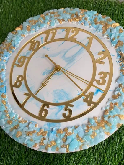 A variation of the blue marble clock, this piece has a full border of blue and gold crystals for extra sparkle.