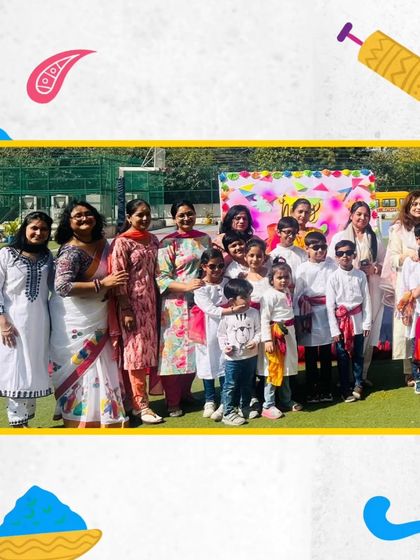 Teachers and students pose together during the Holi celebrations. These events provide a wonderful opportunity for informal interaction and bonding outside the classroom.