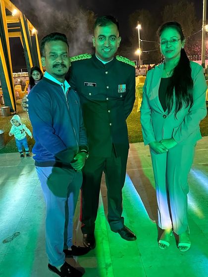 A photo with my partner Kundan and an Indian Army officer in Jammu. We are a team, dedicated to delivering powerful performances for our armed forces.
