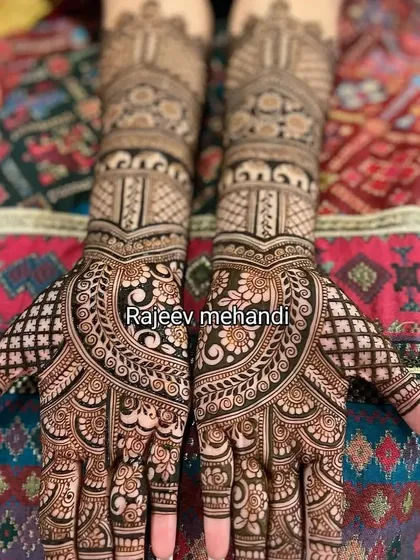 A classic design for the back of the hands, featuring large, intricate mandalas.