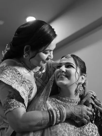 Some moments are just for a mother and her daughter. The tears of joy, the proud embrace, the unspoken blessings. These are the precious, fleeting emotions that become family treasures.