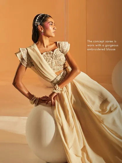 The Jenna Saree Set, styled to show its modern silhouette. The concept saree is paired with a gorgeous embroidered blouse for a look perfect for cocktail parties.