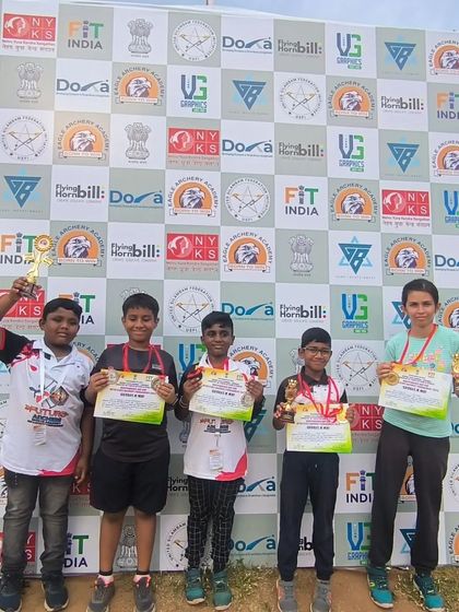 Our team standing tall after a successful competition. Each student here holds a certificate and a trophy, representing their hard-earned success and contribution to the team's performance.