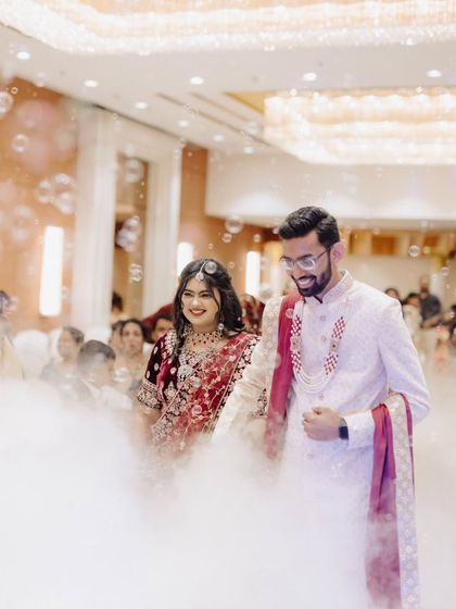 Walking on clouds. The couple's entry was made even more magical with a combination of a bubble machine and a low fog effect, creating a dreamy, ethereal path for their first steps as a married couple.