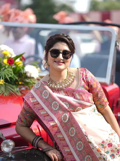A guest enjoying the baraat from a vintage car. I make sure to capture not just the couple, but also the friends and family who make the day special.