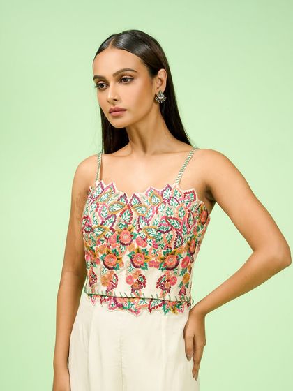 This extensive collection features a wide array of modern festive attire. From vibrant sharara sets and elegant anarkalis to chic jumpsuits and light lehengas, these pieces are curated for wedding guests and anyone looking for a stylish outfit for a special occasion.