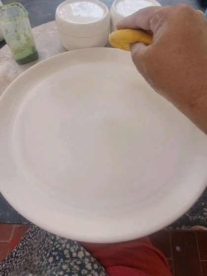A duplicate image showing the blank plate before painting.