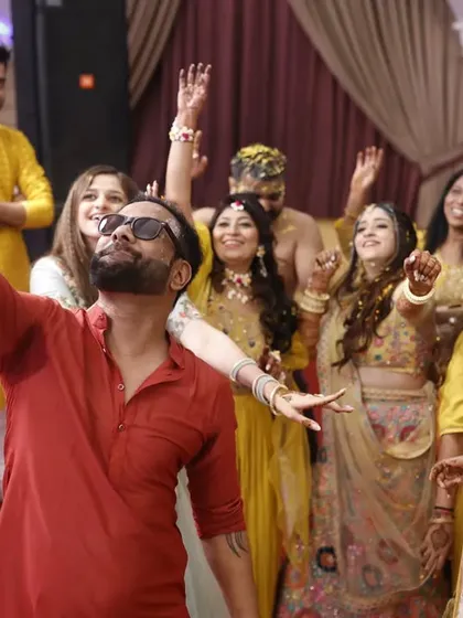 Happy faces all around. Taking a selfie with the bride and her family during a fun-filled Haldi ceremony.