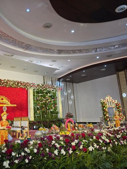 Another view of the Krishna-themed stage, this time combined with a cradle for a naming ceremony.