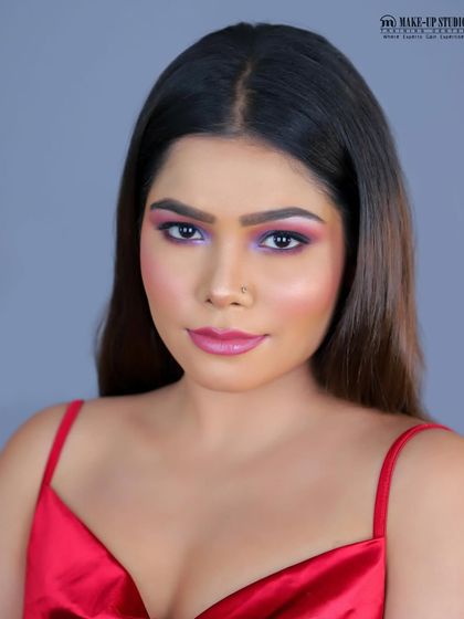 A vibrant pink and purple look created by one of my talented students for their glam assessment. I encourage bold color choices.