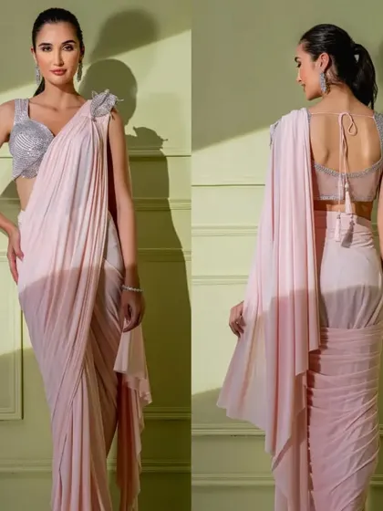 The full front and back view of the soft pink drape saree, highlighting the sheer back of the sequined blouse and the elegant fall of the fabric.