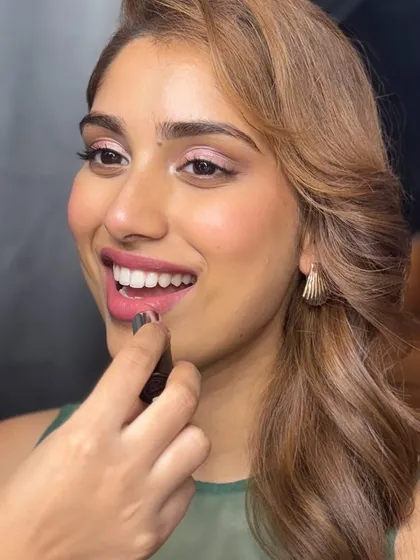A close-up of a soft glam party look, showing the real, unfiltered skin texture. I believe in makeup that looks like skin, just more luminous. This is the result of careful technique and high-quality products, no filters needed.