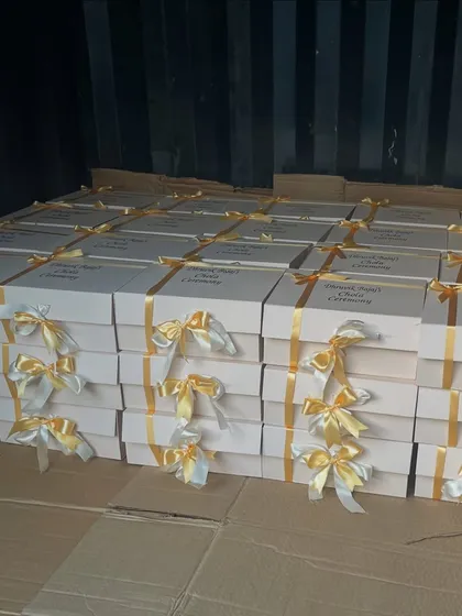 This shows a large bulk order of customized boxes for a Chola ceremony, all packed and ready for dispatch. Even for last-minute orders, we ensure every detail is perfect.