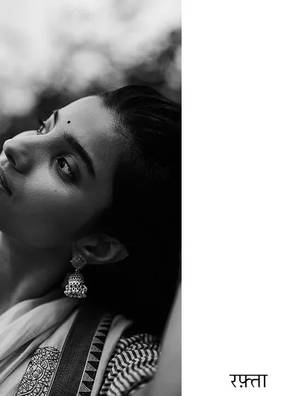 From my personal series 'Rafta'. A quiet, contemplative black and white portrait taken outdoors, capturing a moment of peace and connection.
