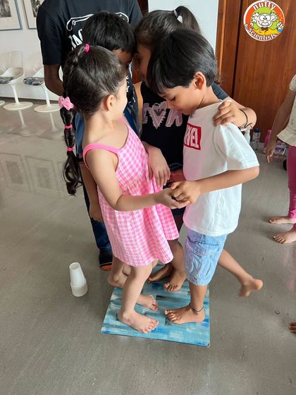 Can a few paper cups support your weight? This teamwork-focused activity challenges kids to work together and learn about weight distribution and structural strength.