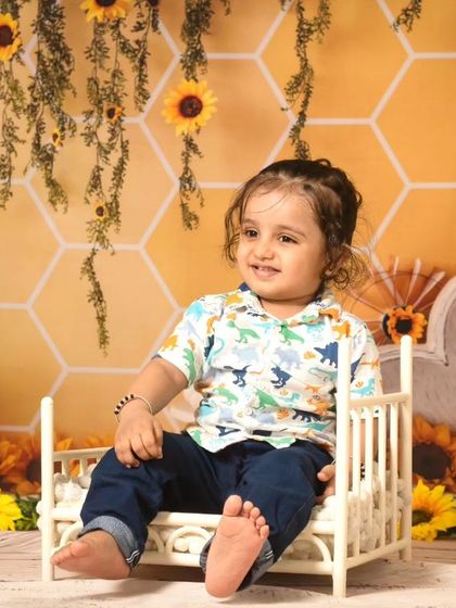 A collection of candid and playful moments from a sunflower-themed session, showing a range of expressions from curious to joyful.