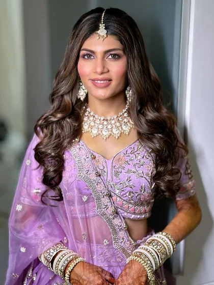 My bride Sai looking absolutely breathtaking in a lavender lehenga for her wedding. This is how you do a modern, non-traditional bridal color.