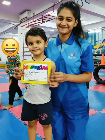 A big smile from this young boy who just received his "Awesomeness" certificate.