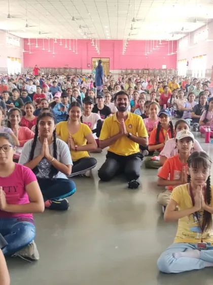 A large group of students from St. Joseph School in Hoshiarpur join our instructor for a yoga session. We are passionate about bringing the benefits of yoga and meditation, like improved concentration and calmness, to students of all ages.