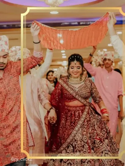 A gorgeous shot of the bride's entry, surrounded by family. The men are wearing our rental kurtas and safas, completing the traditional aesthetic of the ceremony.