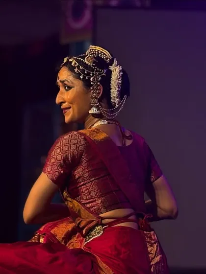 A candid moment of expression, caught mid-performance at the temple festival.