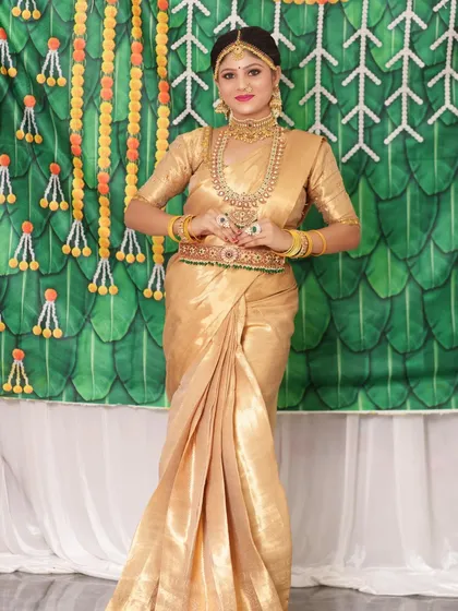 A full-length shot of the bride, looking absolutely regal in her complete bridal attire.