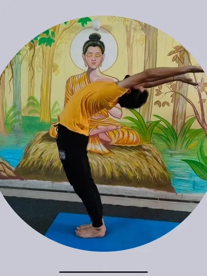 A demonstration of Ardha Chakrasana, the standing half wheel pose. This is a more accessible backbend that we often practice in our Hatha yoga group sessions.
