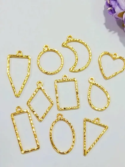 Our textured bezels are perfect for adding extra detail to your pendants and charms. This pack of 10 assorted shapes in a gold finish offers great value and variety for your projects.