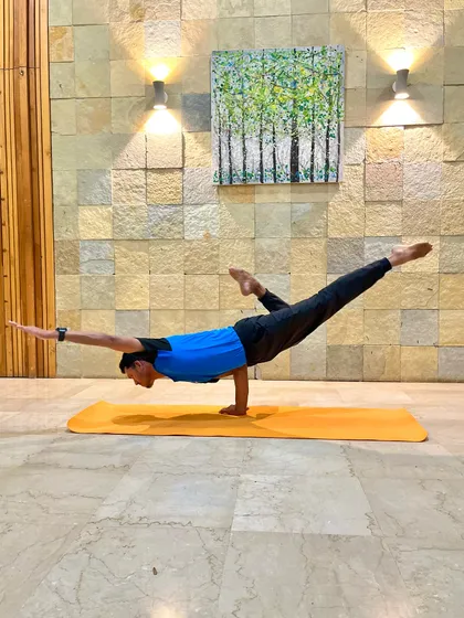 One-Handed Mayurasana with a leg variation. The practice of yoga reflects in our way of being: stronger on the outside, but softer on the inside, like a coconut.
