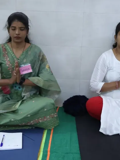 Two participants in our Meditation Teacher Training program sit for a practice session. The program is designed to guide students on a deep journey of self-discovery and equip them to teach meditation effectively.