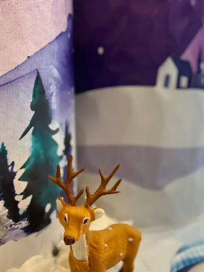 Here is a detail shot from the Winter Wonderland setup, showing a miniature reindeer figurine placed next to custom-printed plinths. I use these small elements to add layers and visual interest to the overall decoration.