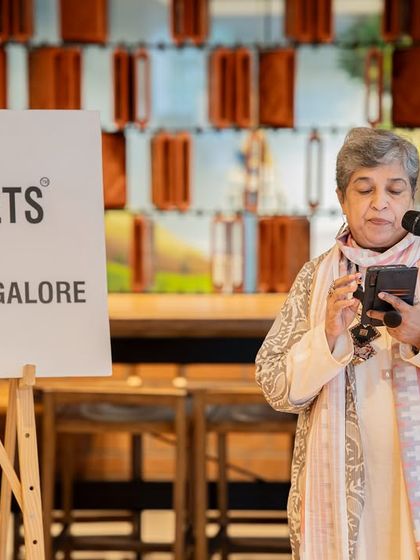 An elegant performer shares her verses. Our Mother's Day event brought together multiple generations to celebrate through poetry.