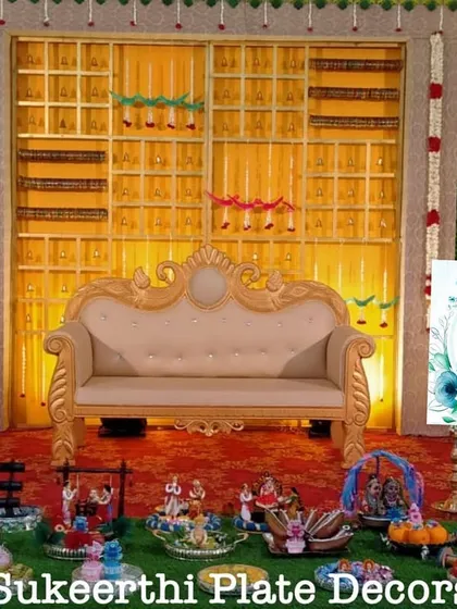 This baby shower decoration in Nambiyur features a unique backdrop with elephant motifs. My platter arrangements are designed to match the theme and color scheme of the event.