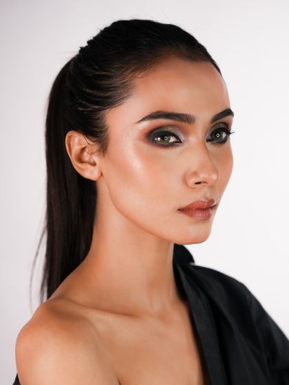 A classic glam look with a dark, winged-out smokey eye and glowing skin. This is a staple in any professional makeup artist's skill set.