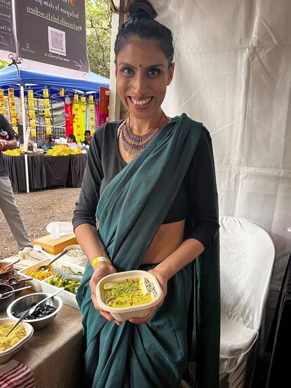 Serving up a healthy, wholesome bowl at our festival stall. My goal is to make nutritious, plant-based food accessible and show people how delicious and satisfying it can be, even in a bustling event setting.