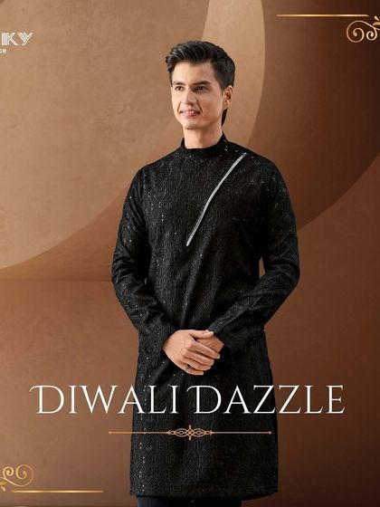 Our Diwali Dazzle campaign. This image showcases a modern black kurta with a striking diagonal silver embellishment.