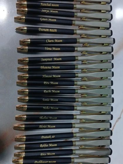 A bulk order of personalized pens, likely for Teacher's Day, with "Ma'am" and "Sir" added to the names.