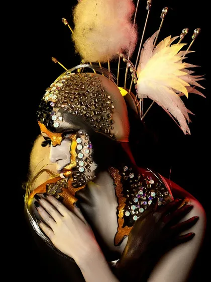 A fantasy portrait created by one of my talented students. The look is inspired by a butterfly, using textured elements, gold leaf, and dramatic lighting to create a magical effect.