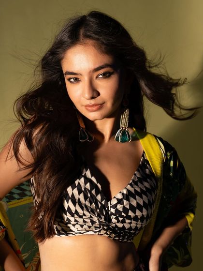 Another close-up, this time with a softer expression, showcasing the versatility of looks we can achieve in one session.