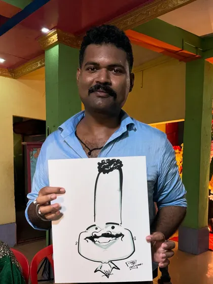 A caricature as bold and memorable as his mustache! Capturing this defining feature was the key to this fun portrait.