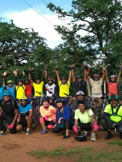 A mandatory group photo from our ride through the Nallur Tamarind Grove. Exploring these green trails is what our off-road cycling adventures are all about.