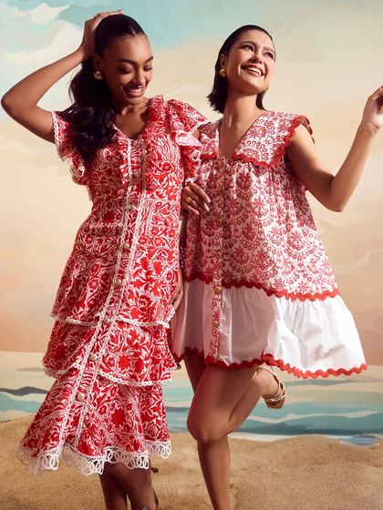 Two models showcasing complementary outfits from Qala Clothing's summer collection. Our production management ensures cohesive group shots that align with the campaign's narrative.