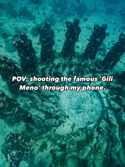 A point-of-view shot of me capturing the famous Gili Meno underwater statues with just my phone.