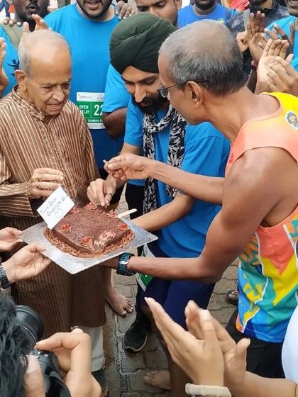 Celebrating a member's birthday with a cake right after a run. We are a family, and we make sure to celebrate these special moments together. The running community is the best community.